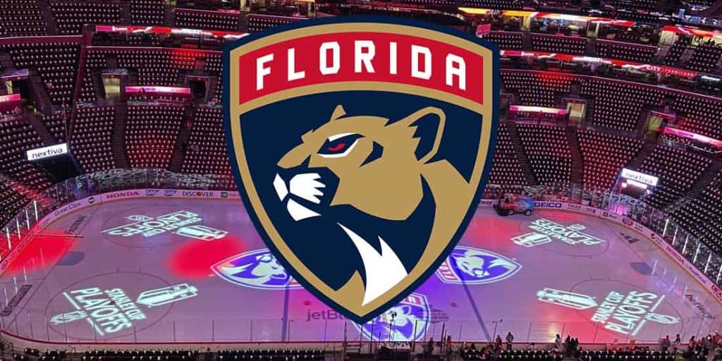 a Florida Panthers logo over their home ice