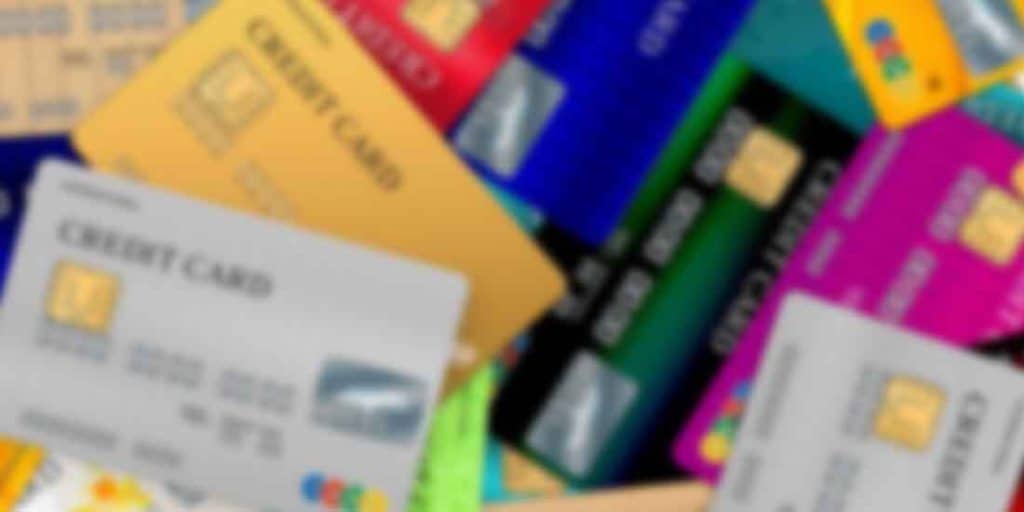 a blurry image of a pile of credit cards