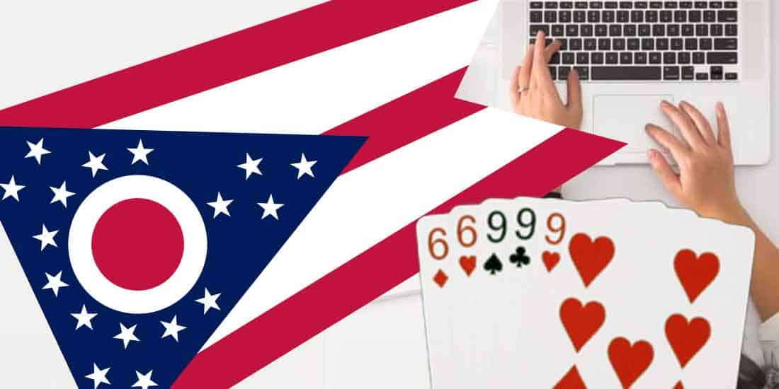 An Ohio state flag, a full house poker hand, and a woman typing on a laptop